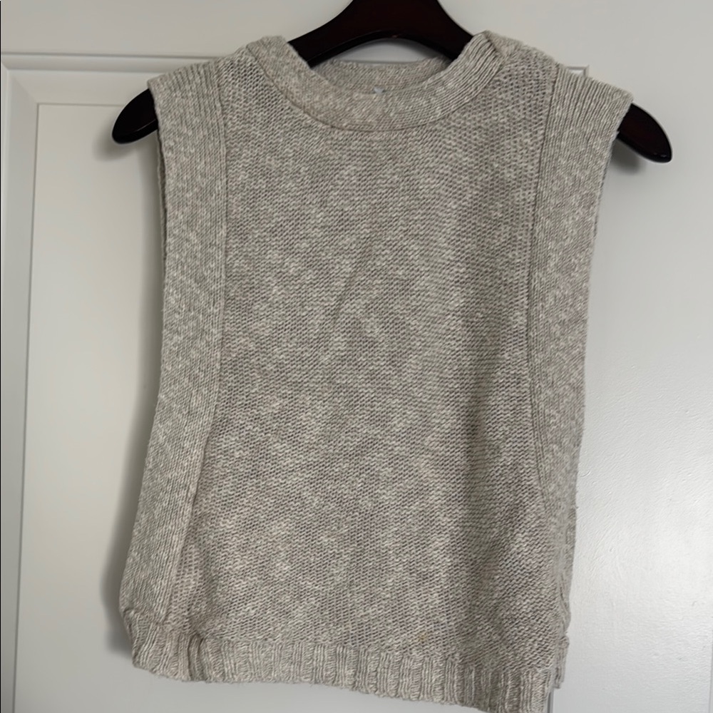 Cream Sleeveless Knit Sweater with Open Sides
